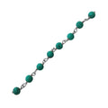 Silver overlay over copper turquoise shell beading chain with polished finish and round blue beads displayed for wholesale jewelry manufacturing use