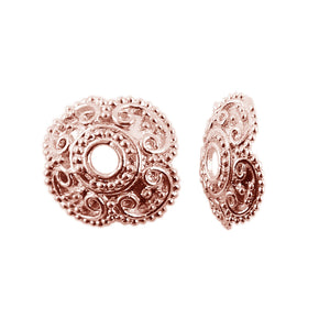 Rose Gold Overlay Over Copper bead cap featuring intricate floral scroll detailing, polished finish, and rounded domed shape for wholesale jewelry manufacturing use