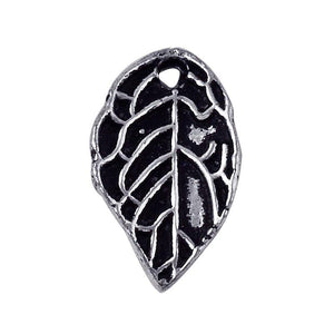 Silver overlay over copper leaf charm handcrafted in India for wholesale jewelry manufacturing