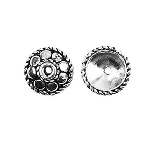 Silver Overlay Over Copper round floral bead cap handcrafted in India with oxidized finish and rope border detail.