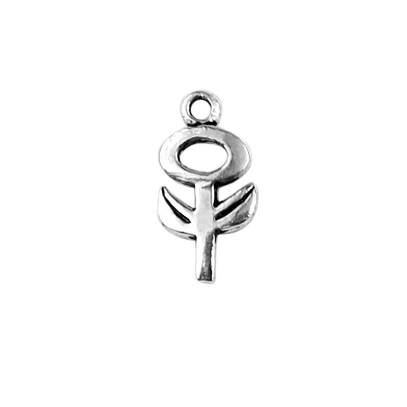 Handcrafted silver overlay abstract symbol charm made of silver overlay over copper with circular top and leaf design in India.