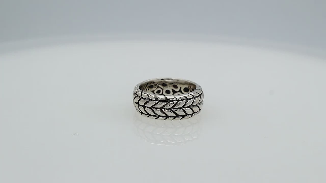 Wholesale sterling silver woven leaf band ring with oxidized Bali-inspired design, handcrafted artisan silver jewelry in bulk for retailers and resellers.
