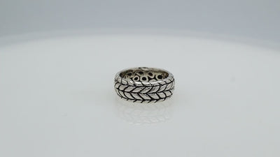 Wholesale sterling silver woven leaf band ring with oxidized Bali-inspired design, handcrafted artisan silver jewelry in bulk for retailers and resellers.