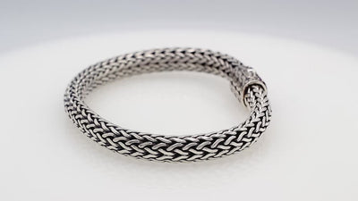 925 sterling silver Bali bracelet with Blue Topaz Quartz clasp and oxidized finish.