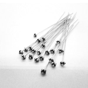 Handcrafted silver overlay over copper triple-ball head pin made in India for wholesale jewelry manufacturing.