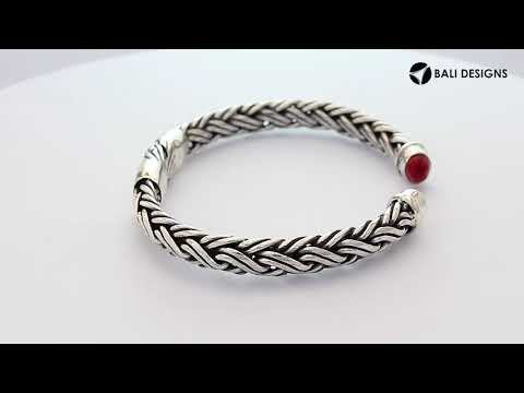 Sterling silver braided bangle with Coral ends handcrafted in Bali for wholesale jewelry collections.