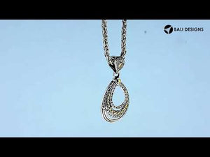 Teardrop silver pendant with 18K gold and diamond detailing