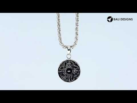 Handcrafted 925 Sterling Silver Abalone Shell round pendant featuring floral center pattern, mirror-polished finish, and iridescent tones with detailed Balinese silver artistry for wholesale buyers.