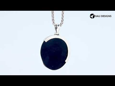 Sterling silver round pendant with vibrant abalone shell inlay and artistic silver overlay, handcrafted Bali jewelry available for wholesale purchase.