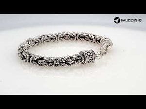 Wholesale sterling silver bracelet featuring a handcrafted 6MM Balinese woven chain with oxidized highlights and a secure lobster lock suitable for catalog and bulk listings.