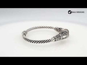 Sterling silver twisted bangle with pearl ends and oxidized Balinese design