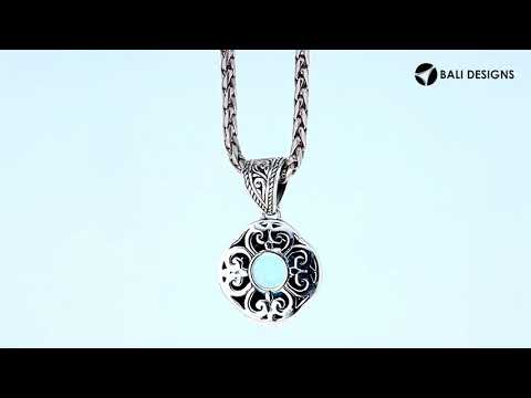 Sterling silver round pendant with Blue Topaz Quartz handcrafted in traditional Balinese design