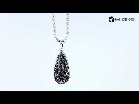 Wholesale sterling silver teardrop pendant with abalone shell inlay, handcrafted Bali jewelry for bulk buyers and boutiques.