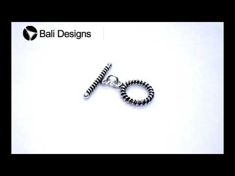Silver Overlay textured toggle clasp with circular ridged loop and matching bar, handcrafted jewelry finding for wholesale buyers, handcrafted in India.