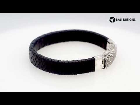 Sterling silver and black leather bracelet with ornate Balinese clasp and oxidized finish