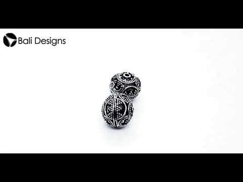 Handcrafted granulated round silver overlay over copper bead with curved Indian design