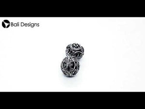 Handcrafted granulated round silver overlay over copper bead with curved Indian design