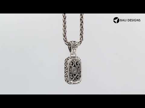 Sterling silver rectangular pendant featuring Black Onyx centerpiece with traditional Balinese beaded frame and oxidized detailing.