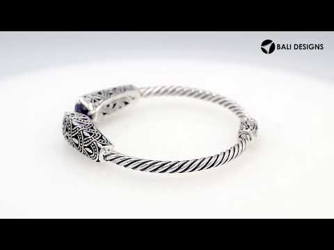 Sterling silver twisted bangle with amethyst quartz ends and oxidized Balinese design