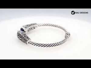 Sterling silver twisted bangle with amethyst quartz ends and oxidized Balinese design