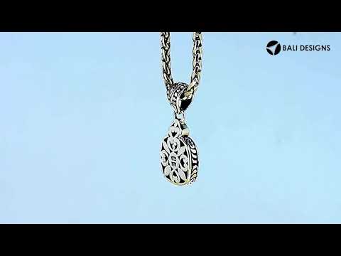 Square silver floral pendant with gold and diamond accents