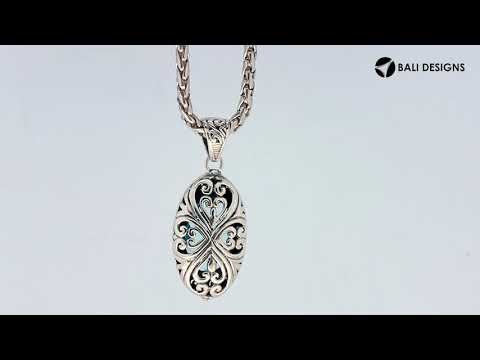 Sterling silver oval pendant with London Blue Topaz Quartz and Balinese filigree handcrafted design