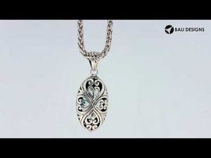 Sterling silver oval pendant with London Blue Topaz Quartz and Balinese filigree handcrafted design