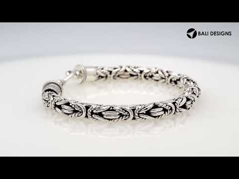 Wholesale sterling silver bracelet with Balinese woven wheat-link design and decorative lobster clasp handcrafted in Bali.