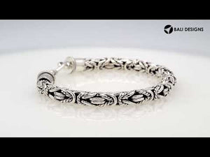 Wholesale sterling silver bracelet with Balinese woven wheat-link design and decorative lobster clasp handcrafted in Bali.