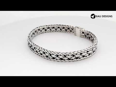 Sterling silver bracelet with Balinese scroll design and toggle lock handcrafted in Bali.