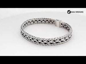 Sterling silver bracelet with Balinese scroll design and toggle lock handcrafted in Bali.