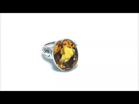 Sterling silver wholesale ring with oval Citrine Quartz and textured carved band, handcrafted in Bali.