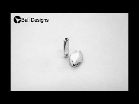 Silver overlay over copper handcrafted oval barrel bead from India with brushed antique finish