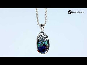 Wholesale sterling silver oval pendant with genuine abalone shell inlay and ornate Balinese filigree design, handcrafted in Bali.
