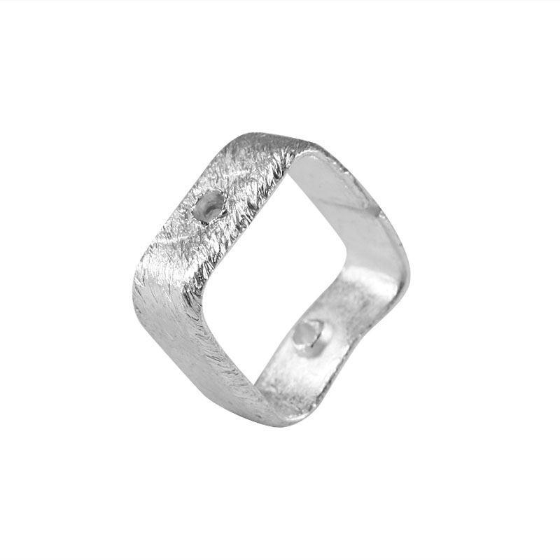 Geometric open frame silver overlay over copper ring blank with wide band and center hole handcrafted in India for wholesale jewelry making