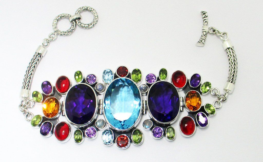 Sterling Silver Multistone Bracelet With Blue Topaz Quartz, Amethyst Quartz, Citrine Quartz, Garnet Quartz, Peridot Quartz And Rainbow Moonstone Quartz In Ornate Panel Design