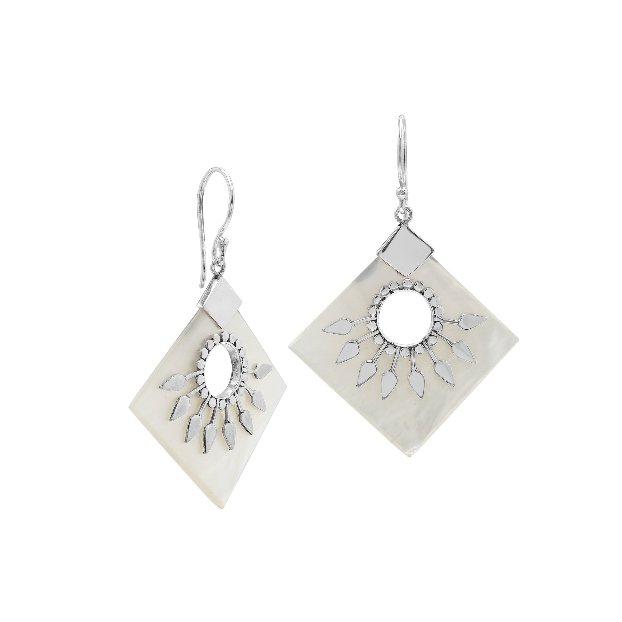 Sterling silver tribal earrings with Mother Of Pearl diamond panels and silver sunburst accents.