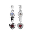Sterling Silver Drop Pendant Featuring Rainbow Moonstone And Garnet Quartz In A Polished Modern Setting.