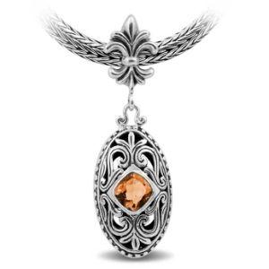 Sterling Silver Ornate Oval Pendant Featuring Citrine Quartz With Fleur-De-Lis Decorative Bail.