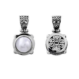 Sterling Silver Pendant With Round Mabe Pearl And Balinese Ornamental Design.