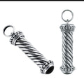 Sterling Silver Black Onyx Twisted Barrel Pendant With Beaded Balinese Caps.
