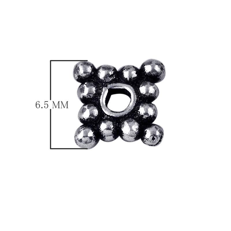 Silver overlay over copper cluster spacer beads handcrafted in India with polished finish and bubble texture.