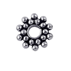 Silver overlay over copper circular cluster spacer beads handcrafted in India with polished finish and bubble detailing.