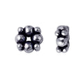 Silver overlay over copper compact cluster spacer beads handcrafted in India with polished finish and dense bubble detailing.