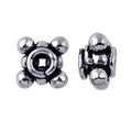 Silver Overlay Over Copper antique round beaded spacer jewelry component, handcrafted in India, shown in front and side view.