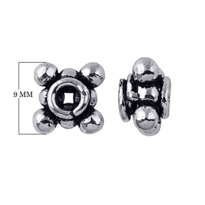 Square-petal gear-style granulated spacer bead in silver overlay over copper with oxidized detailing.