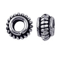 Silver Overlay Over Copper antique gear style beaded spacer jewelry component, handcrafted in India, shown in front and side view.