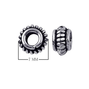 Silver Overlay Over Copper antique gear style beaded spacer jewelry component, handcrafted in India, shown in front and side view.
