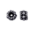 Silver Overlay Over Copper antique twisted rope style spacer jewelry component, handcrafted in India, shown in front and side view.