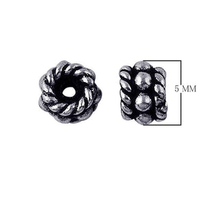 Silver Overlay Over Copper antique twisted rope style spacer jewelry component, handcrafted in India, shown in front and side view.